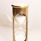 Vintage Medium Brass Hourglass with Clear Glass Middle and White Sand