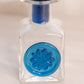 Vintage Rainbow Glass Clear Perfume Bottle with Blue Stopper Flower Accent