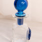 Vintage Rainbow Glass Clear Perfume Bottle with Blue Stopper Flower Accent