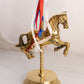 Medium Brass Carousel Horse Figurine with Red, White, and Blue Ribbon