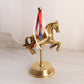 Medium Brass Carousel Horse Figurine with Red, White, and Blue Ribbon