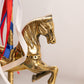 Medium Brass Carousel Horse Figurine with Red, White, and Blue Ribbon