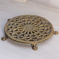 Medium Circular Brass Trivet with Ornate Designs and 5 Feet