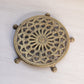 Medium Circular Brass Trivet with Ornate Designs and 5 Feet