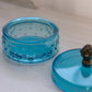 Vintage Small Blue Glass Quilted Lidded Dish and Metal Pinecone Finial