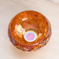Vintage Small Orange Iridescent Carnival Glass Bowl with Sawtooth Edge